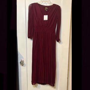 Midi dress with pleated skirt